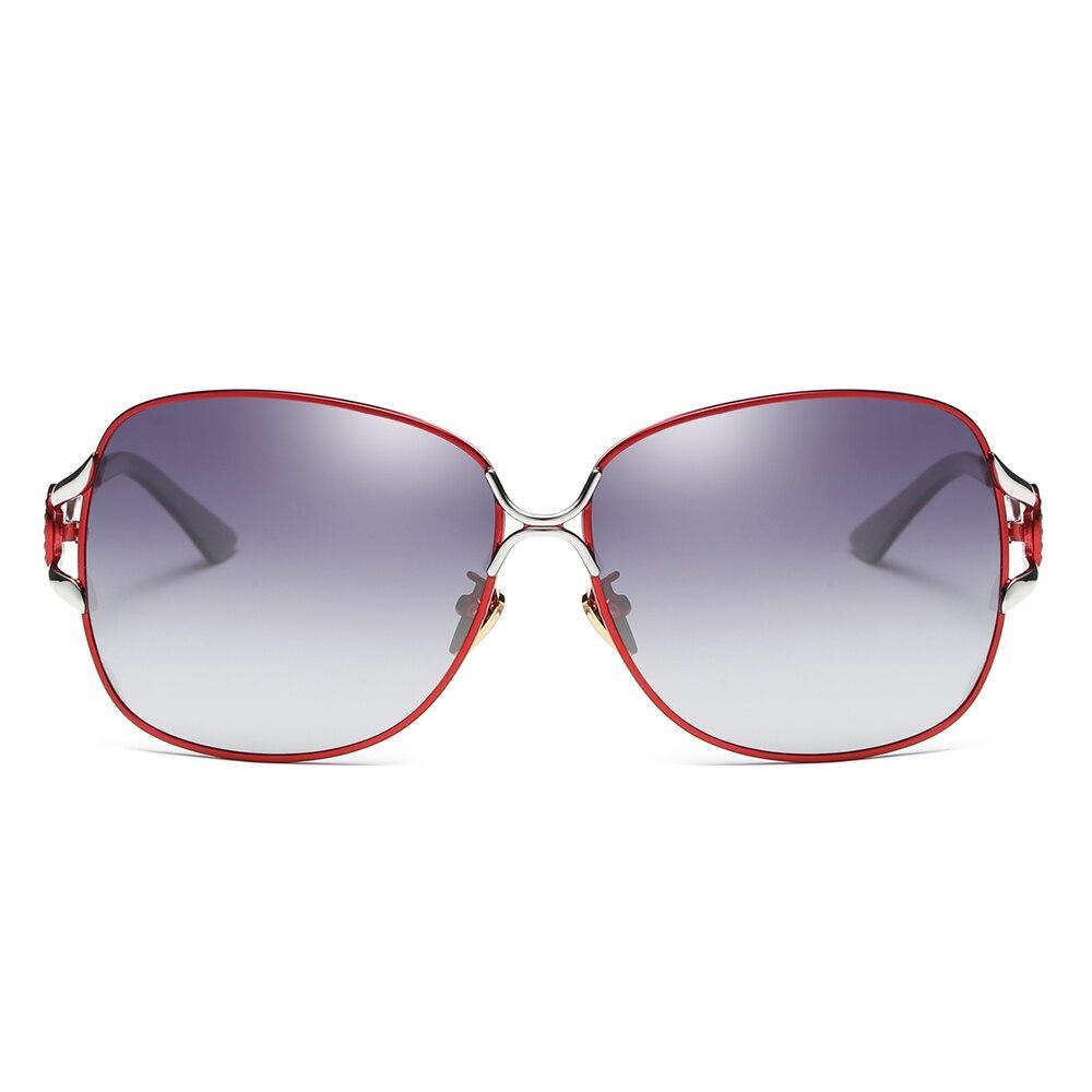Elegant Stevvex polarized luxury women's sunglasses with dark tinted lenses and sleek frame design.