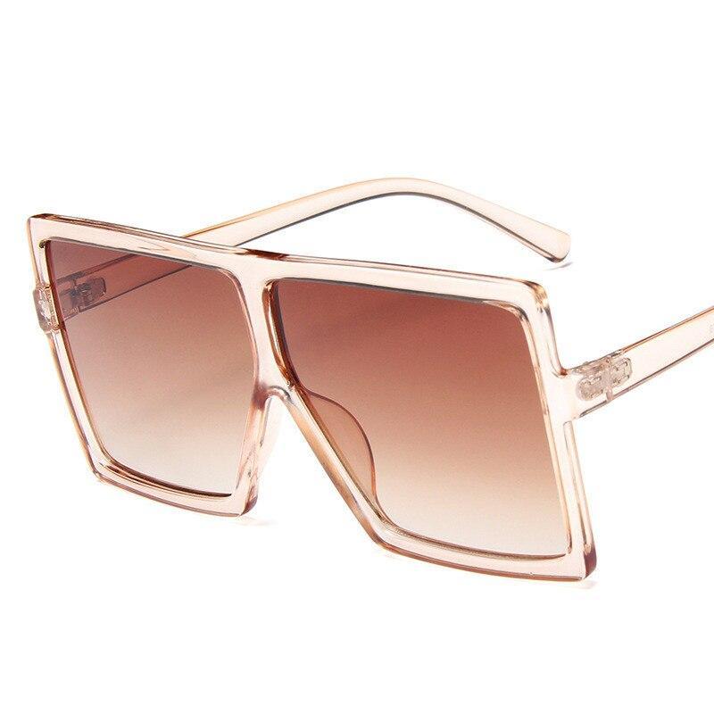 Oversized modern luxury square women's UV400 sunglasses by Stevvex with dark tinted lenses and thick black frames.
