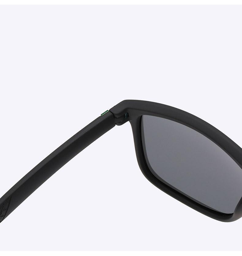 Stevvex classic retro polarized UV400 unisex sunglasses with dark tinted lenses and black frames, stylish and protective eyewear.