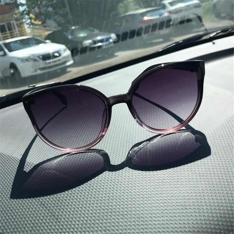 Large cat eye sunglasses for women by Stevvex featuring UV400 protection and modern style, shown with black frames.