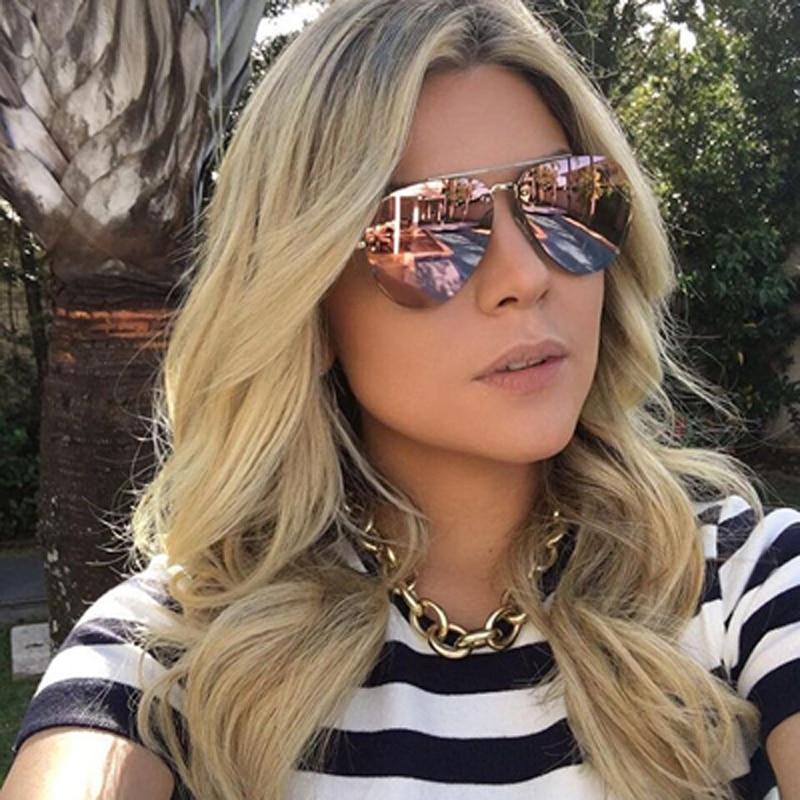Stevvex metal rimless UV-protected gradient sunglasses with sleek design and tinted lenses, ideal for stylish sun protection.