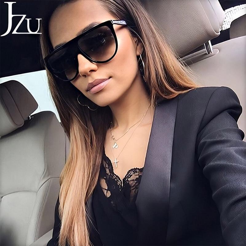 Stevvex oversized vintage women's UV400 sunglasses with retro style and large square frames, reflecting elegant fashion.