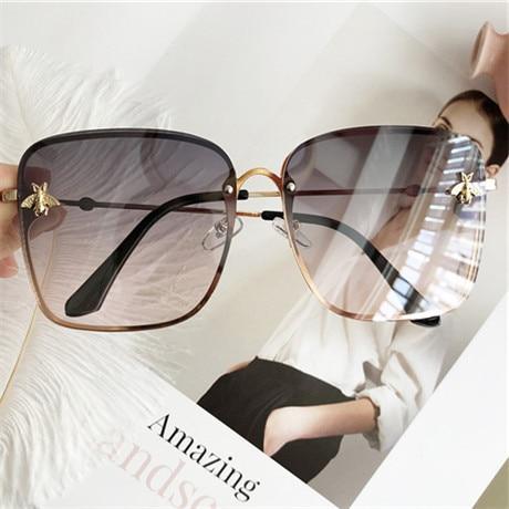 Stevvex oversized square UV400 sunglasses with black frames and dark tinted lenses, stylish and protective eyewear for sunny days.
