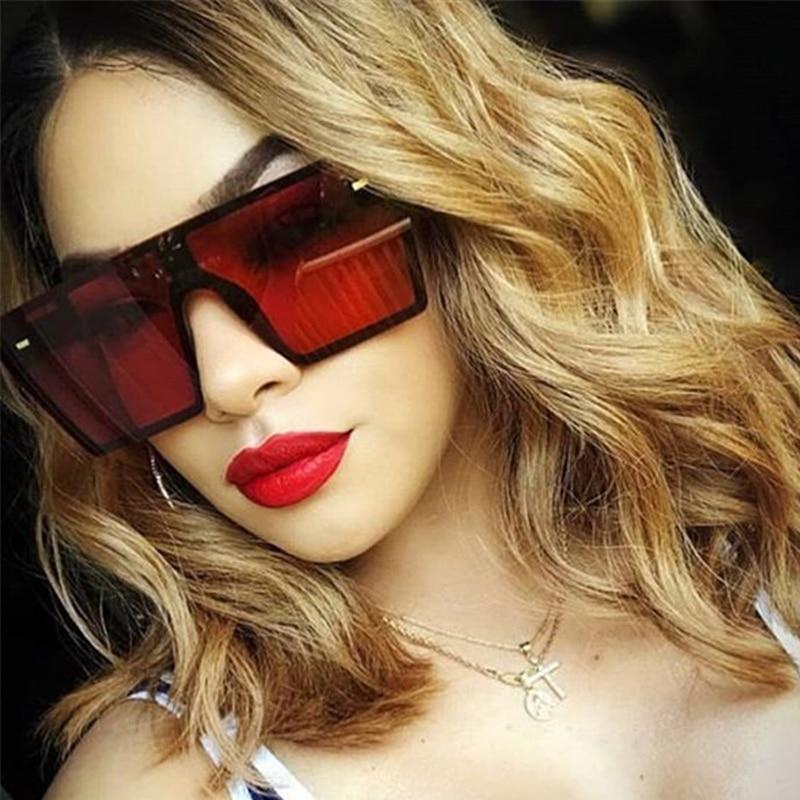 Modern oversized square UV400 sunglasses by Stevvex with black frames and dark lenses, stylish and protective eyewear.