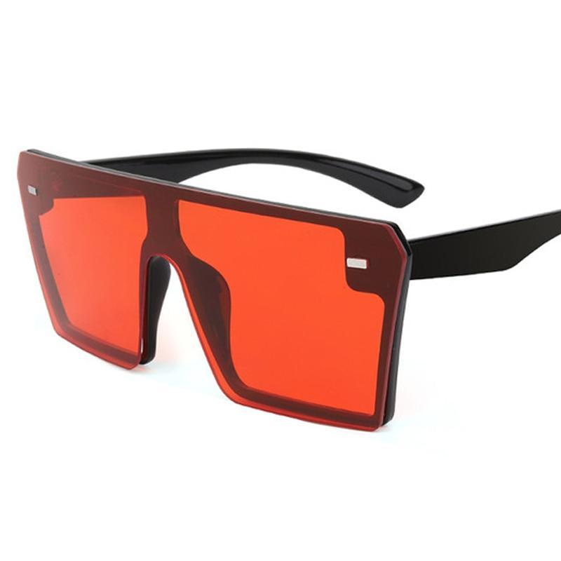 Modern oversized square UV400 sunglasses by Stevvex with black frames and dark tinted lenses.
