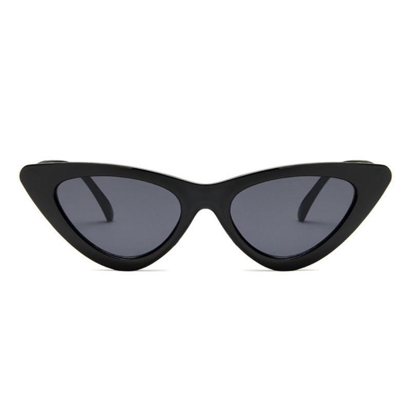 Retro fashion cat eye sunglasses for women by Stevvex with UV400 protection, featuring bold black frames and tinted lenses.