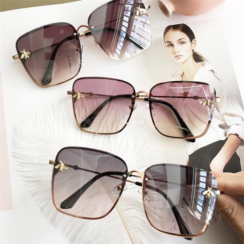 Stevvex oversized square UV400 sunglasses with dark tinted lenses and black frames, stylish and protective eyewear for sunny days
