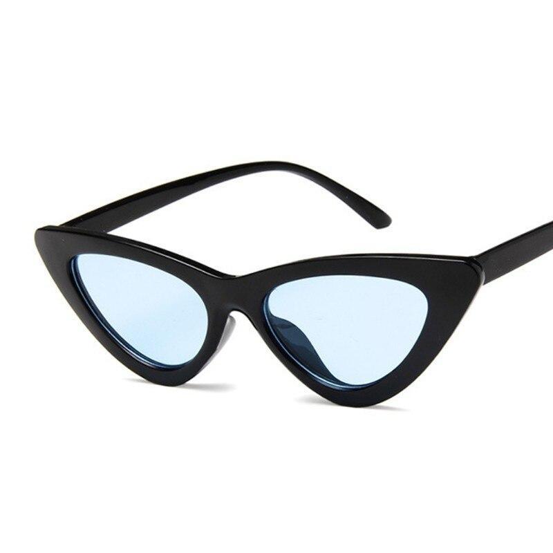 Retro fashion cat eye sunglasses for women by Stevvex with UV400 protection, featuring black frames and dark tinted lenses.