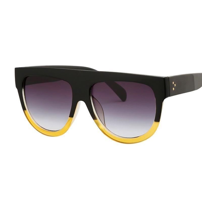 Retro vintage oversized women's sunglasses by Stevvex with UV400 protection, featuring bold frames and tinted lenses.