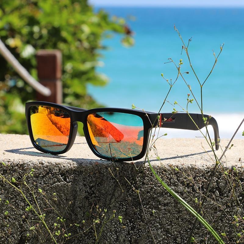 Stevvex photochromatic polarized sunglasses with dark tinted lenses and sleek black frame, designed for outdoor sun protection.