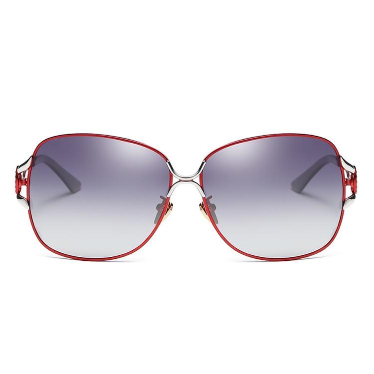 Elegant Stevvex polarized luxury women's sunglasses with dark tinted lenses and stylish frame design.