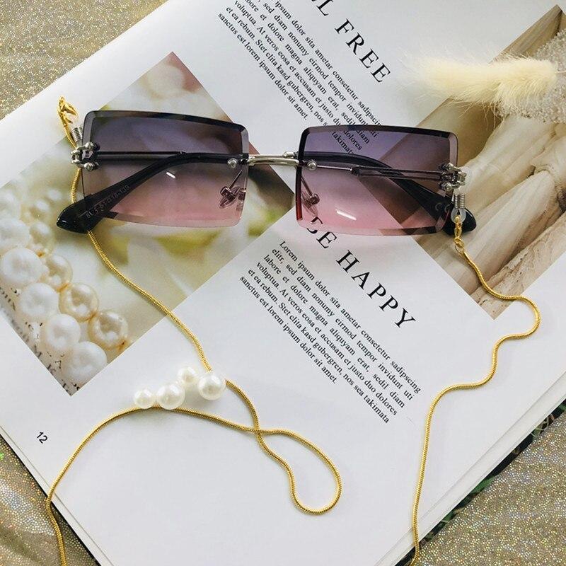 Stevvex fashion rimless rectangle UV400 sunglasses with dark lenses and sleek design, perfect for stylish sun protection.