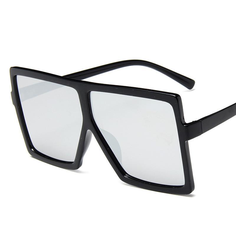Oversized modern luxury square women's UV400 sunglasses by Stevvex with dark tinted lenses and thick black frames.