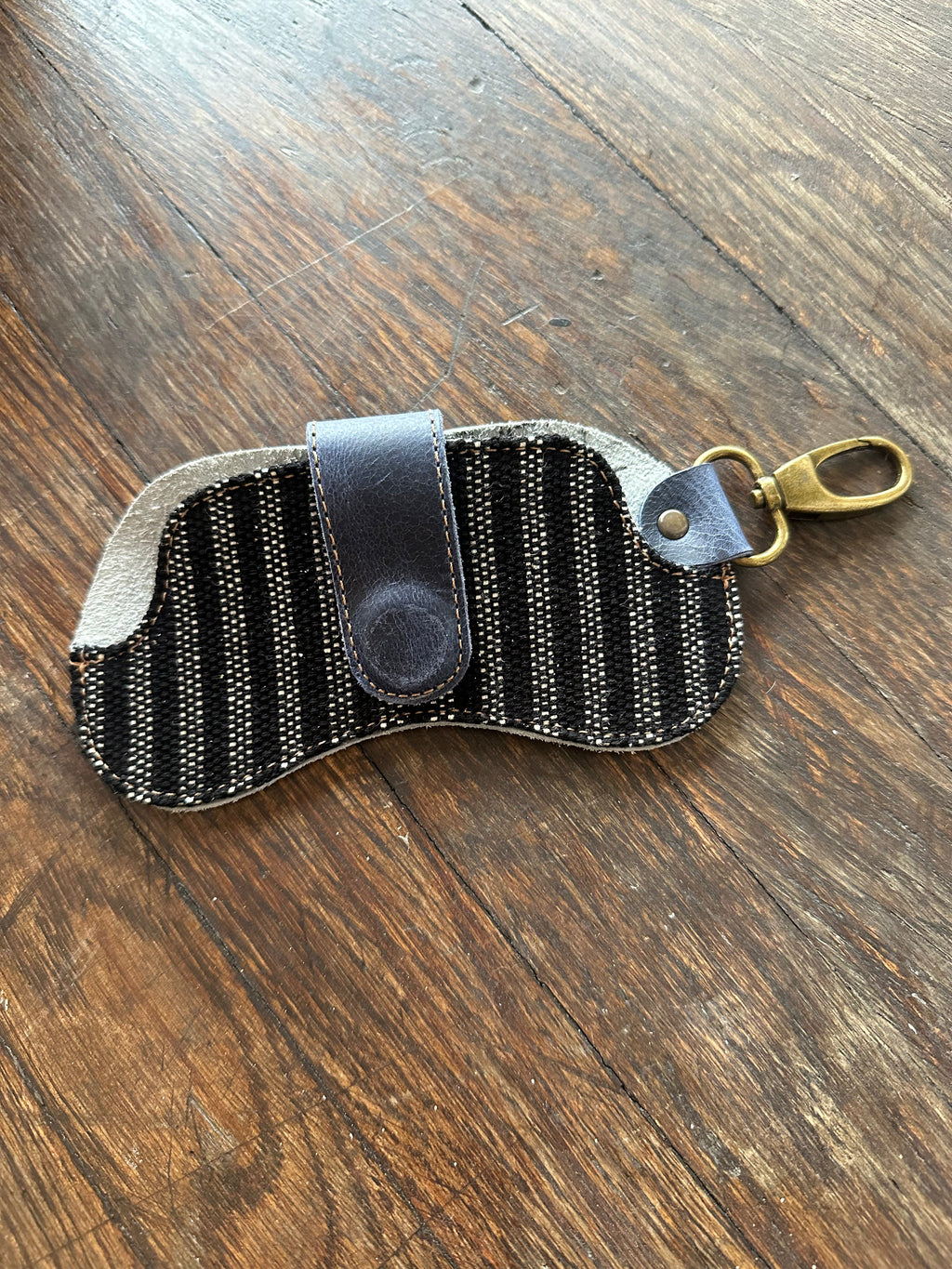 Beetlejuice themed eyewear case by IXCHELTRIANGLE, sturdy protection for sunglasses with a vibrant, movie-inspired design.