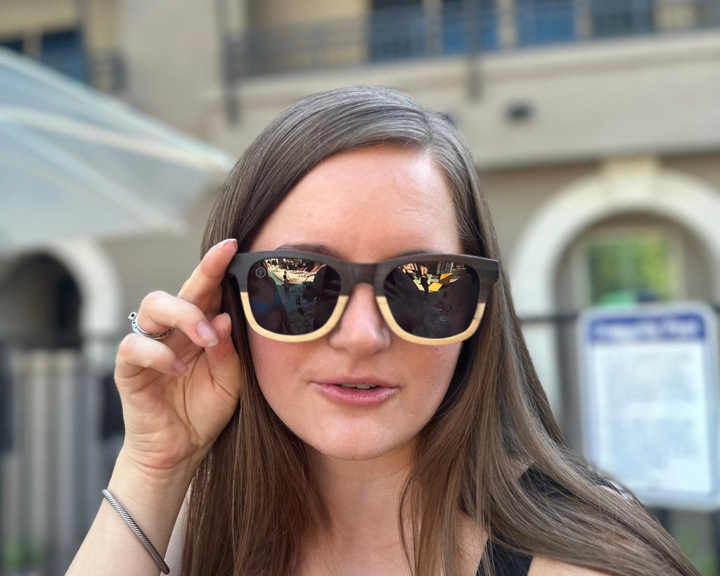 Papago Half Dunes sunglasses with beige frames and tinted lenses, stylishly displayed on a neutral background.