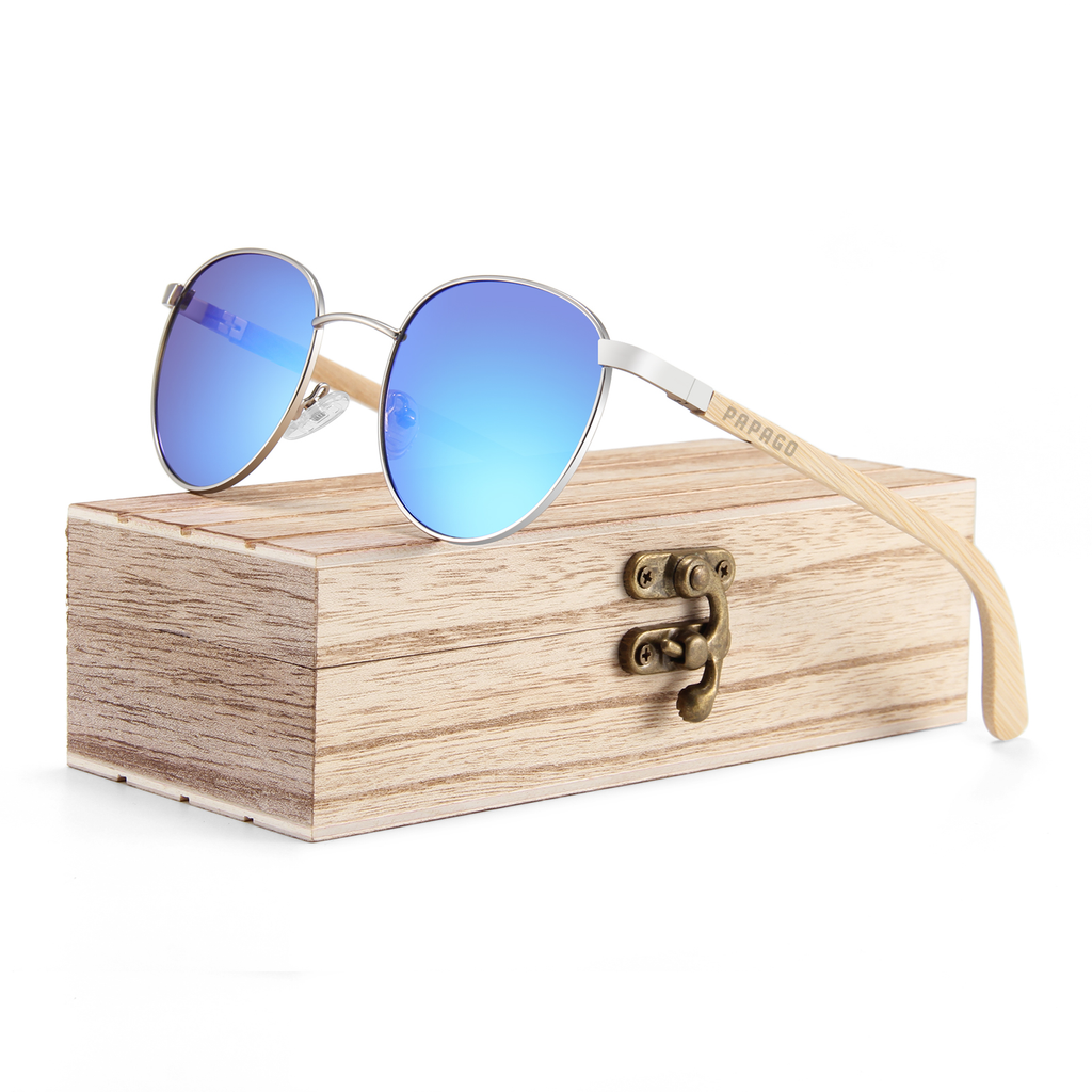 Handmade recycled wooden sunglasses by Papago Azule Onofres, showcasing natural wood frames and stylish design.