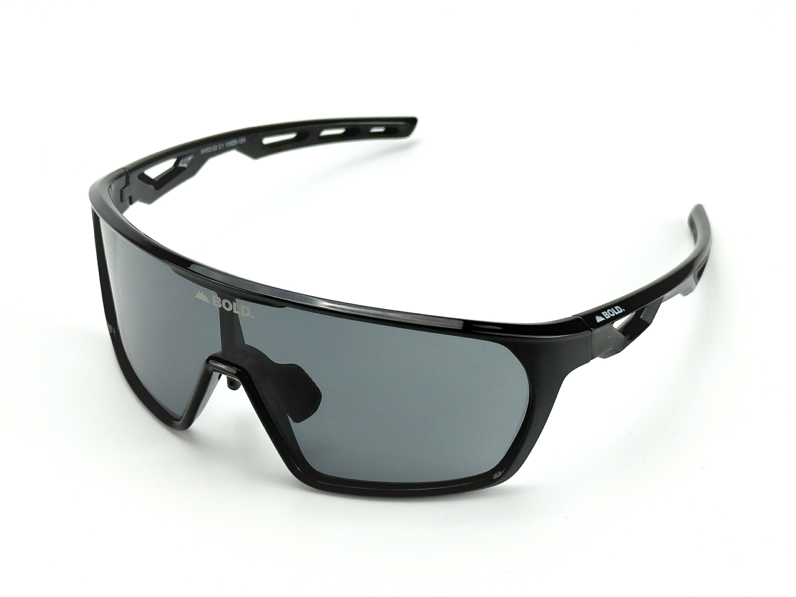 Kids sunglasses by boldouterwear with sporty black frames and tinted lenses, designed for MTB, ski, and lifestyle activities.