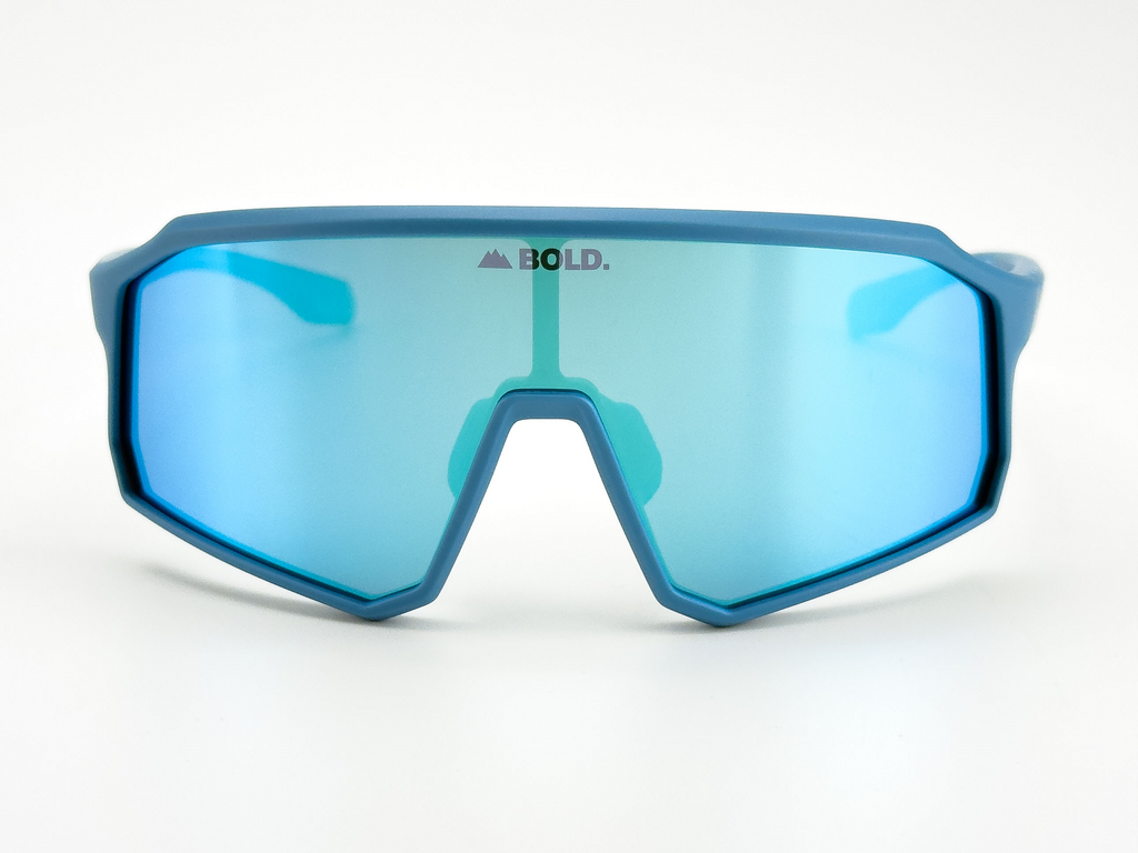 Kids wearing BOLD Rippers sunglasses for MTB, ski, and lifestyle, featuring sporty black frames and tinted lenses.