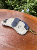 Leather sunglass case with hair-on-hide design from IXCHELTRIANGLE, showcasing a stylish and protective eyewear accessory.