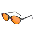 Night-time Ivy Blue Light Blocking Glasses with black frame and orange-tinted lenses by Sleep ZM, designed to reduce blue light exposure.