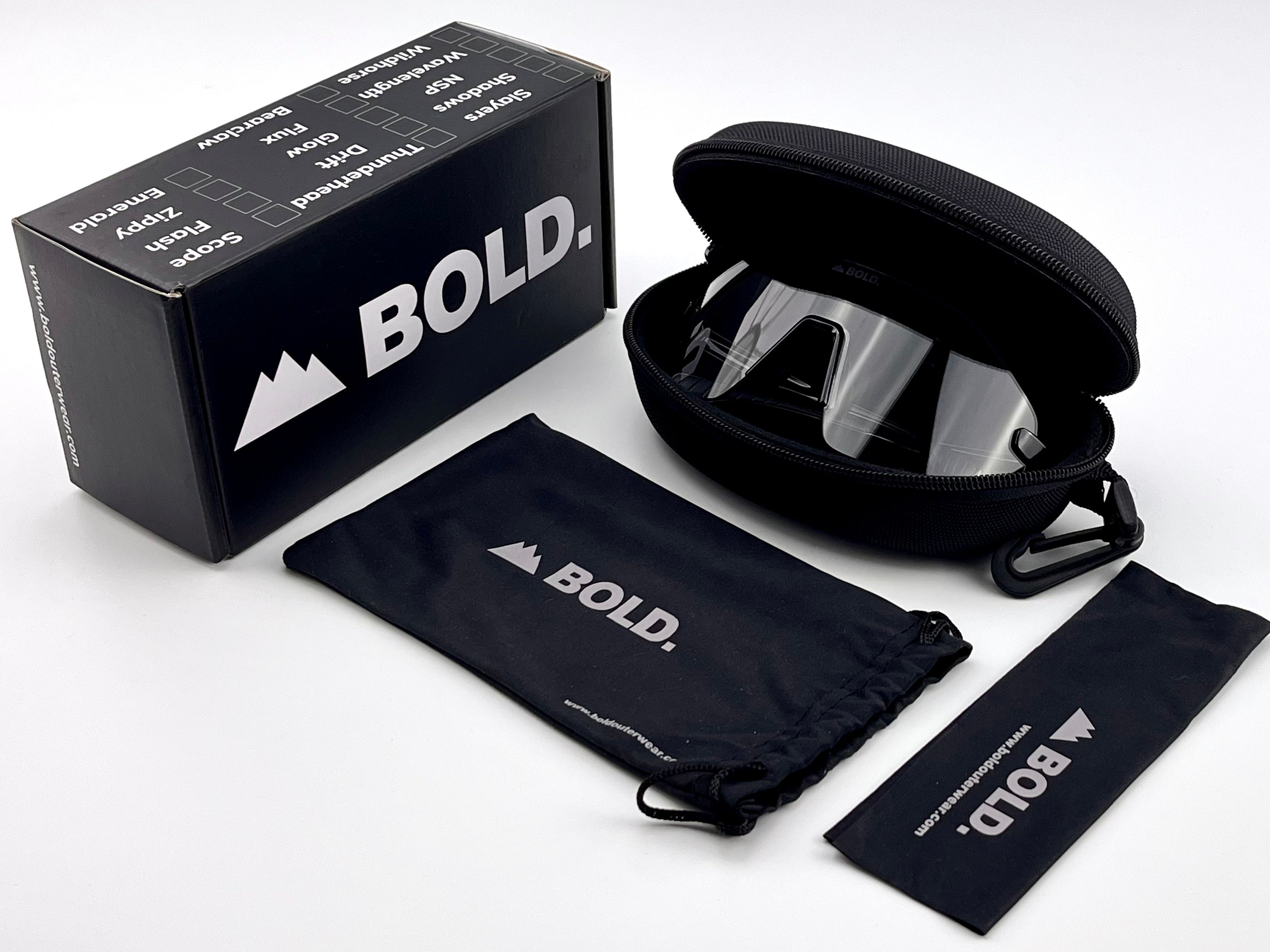 Boldouterwear BOLD Emerald Photochromic Sunglasses outdoors, showcasing the stylish green-tinted sunglasses with photochromic lenses.