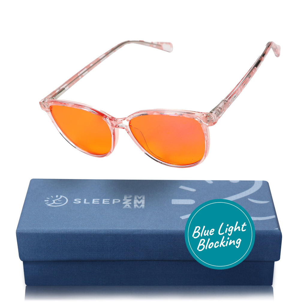 Blue Light Glasses by Sleep ZM, Night-time Wayfarer Pink Warrior blue light blocking glasses in a box, designed for nighttime use.