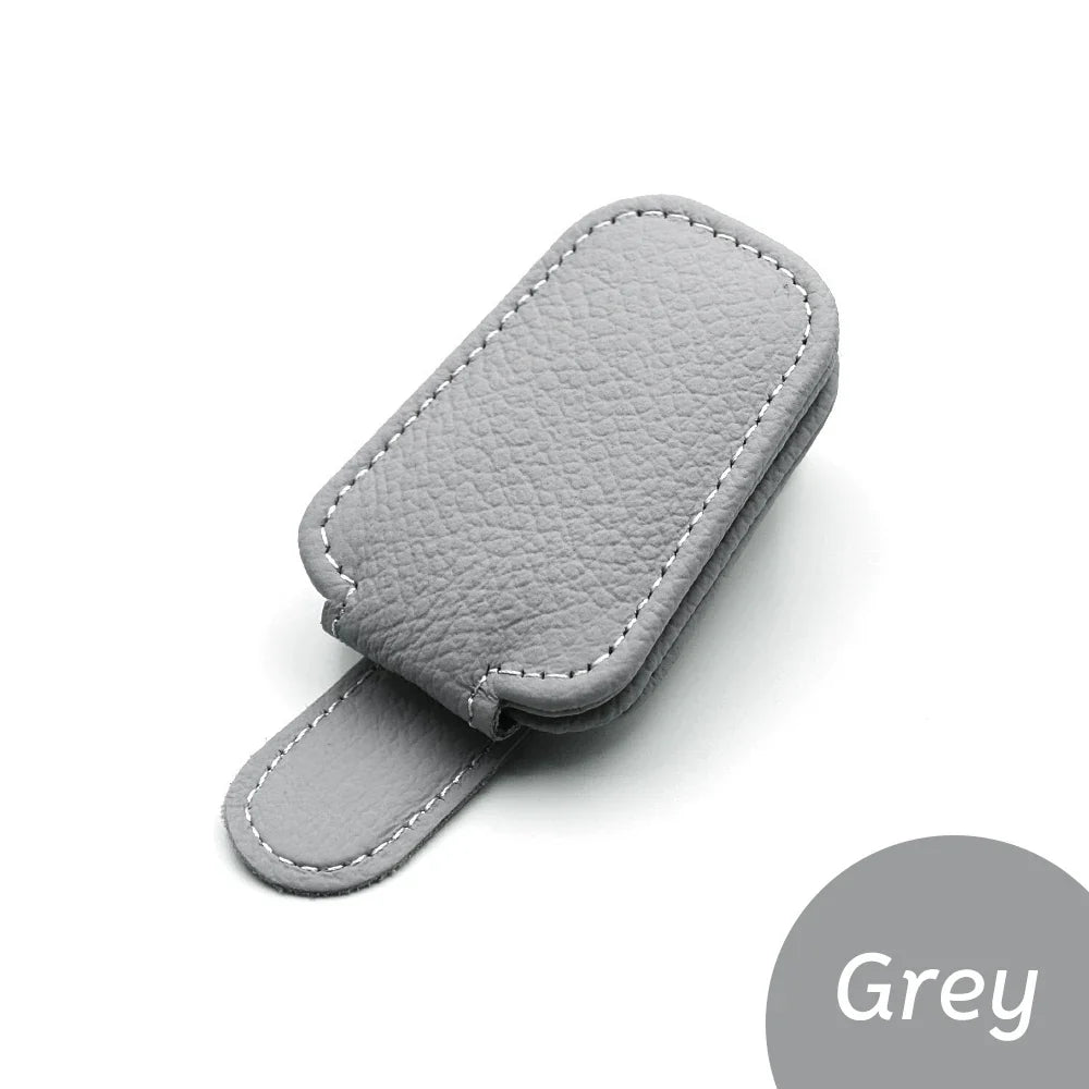 Econic Blanks universal car sun visor sunglasses clip holding sunglasses securely on vehicle sun visor.