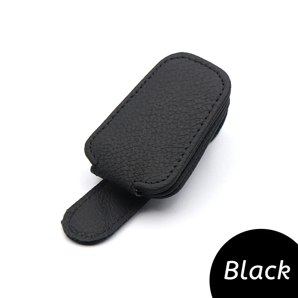 Econic Blanks universal car sun visor sunglasses clip holding sunglasses on a car sun visor for easy access and organization.