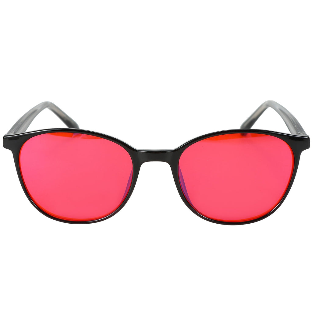 Blue Light Glasses by Sleep ZM, Night-TimeMax Taylor Kids blue light blocking glasses with black frame and red-tinted lenses for children.