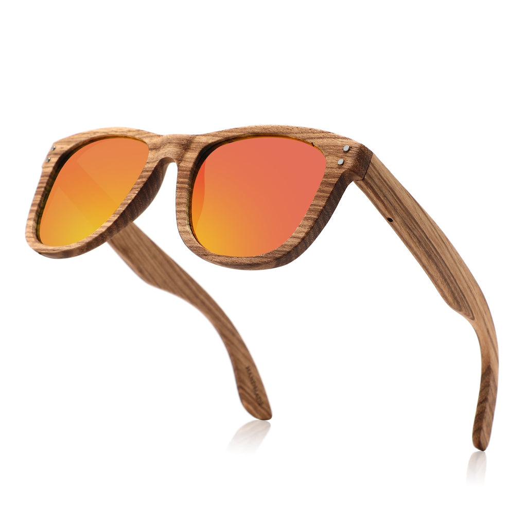 Handmade recycled wooden sunglasses by Papago, featuring Ruby Dunes design with dark tinted lenses and natural wood frame.
