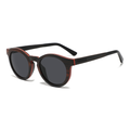 Handmade Papago Dark Roast Sonoras sunglasses with recycled wooden frames, showcasing natural wood grain and stylish design.