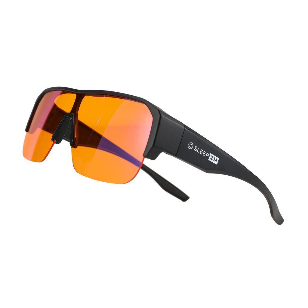 Night-time XXL fit blue light blocking glasses in black by Sleep ZM, designed to reduce eye strain and protect vision in low light.