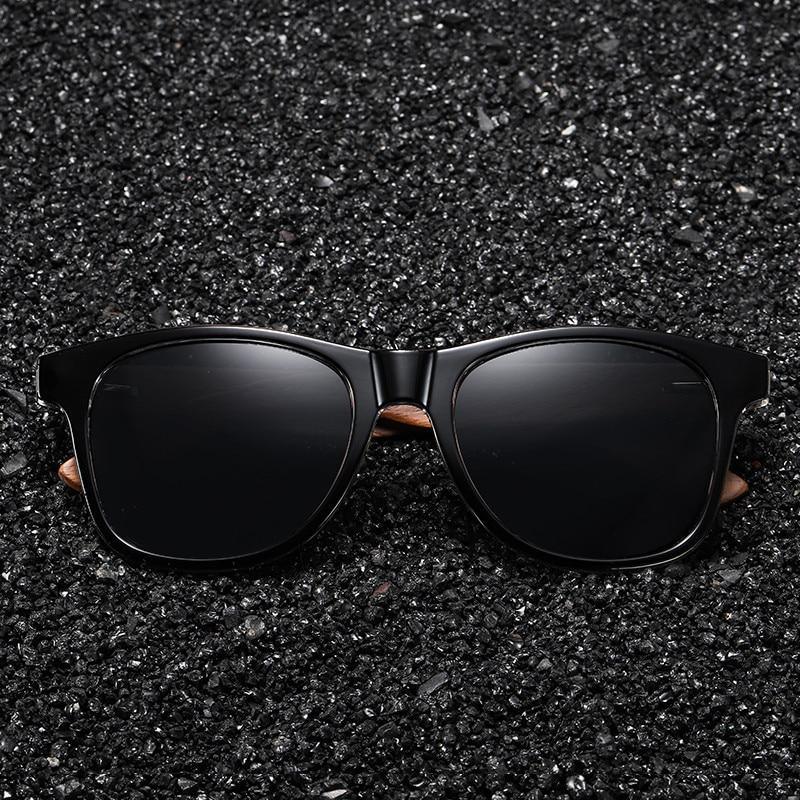 Black Stevvex sunglasses with wood frame, polarized mirror lenses, lightweight design, vintage style, UV protection for men.