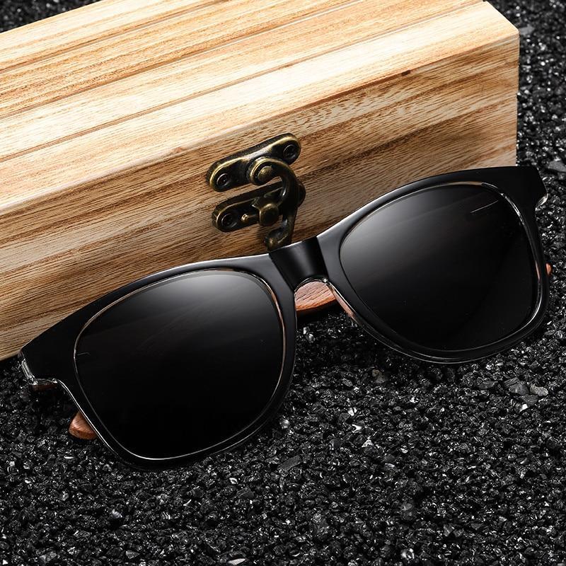 Black Stevvex wood frame polarized sunglasses with mirror lenses, lightweight design, UV protection, and vintage style for men.