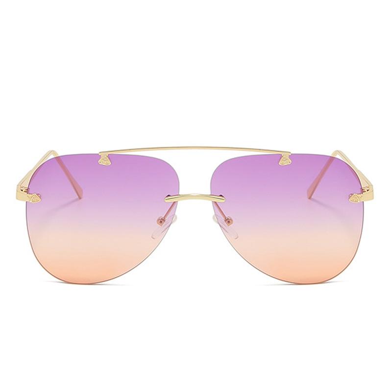 Metal rimless Stevvex sunglasses with UV protection and gradient lenses, showcasing a modern, stylish eyewear design.