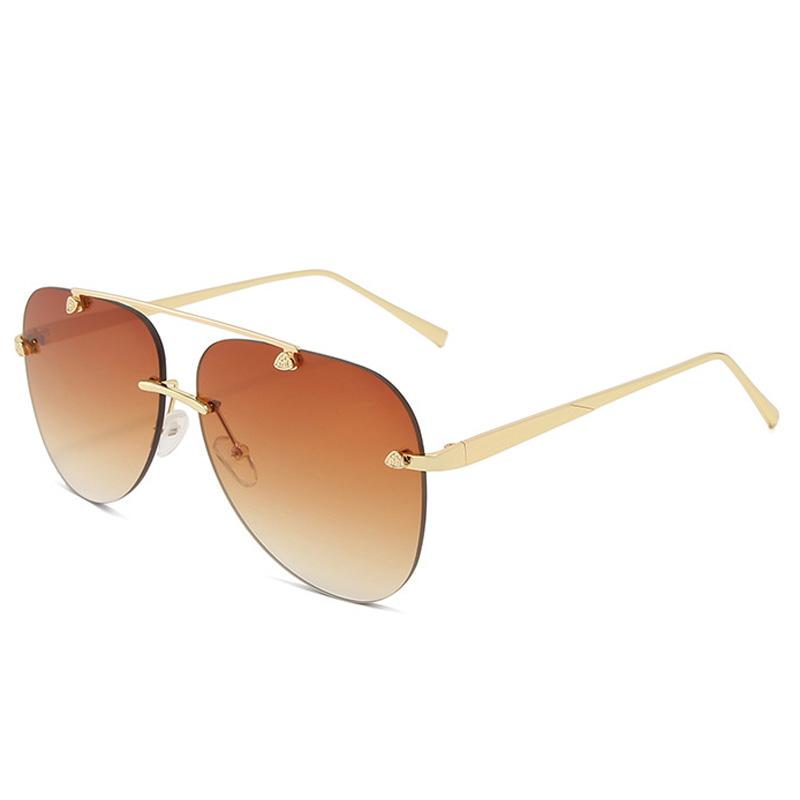 Metal rimless Stevvex sunglasses with gradient UV-protected lenses, showcasing a sleek, modern design.