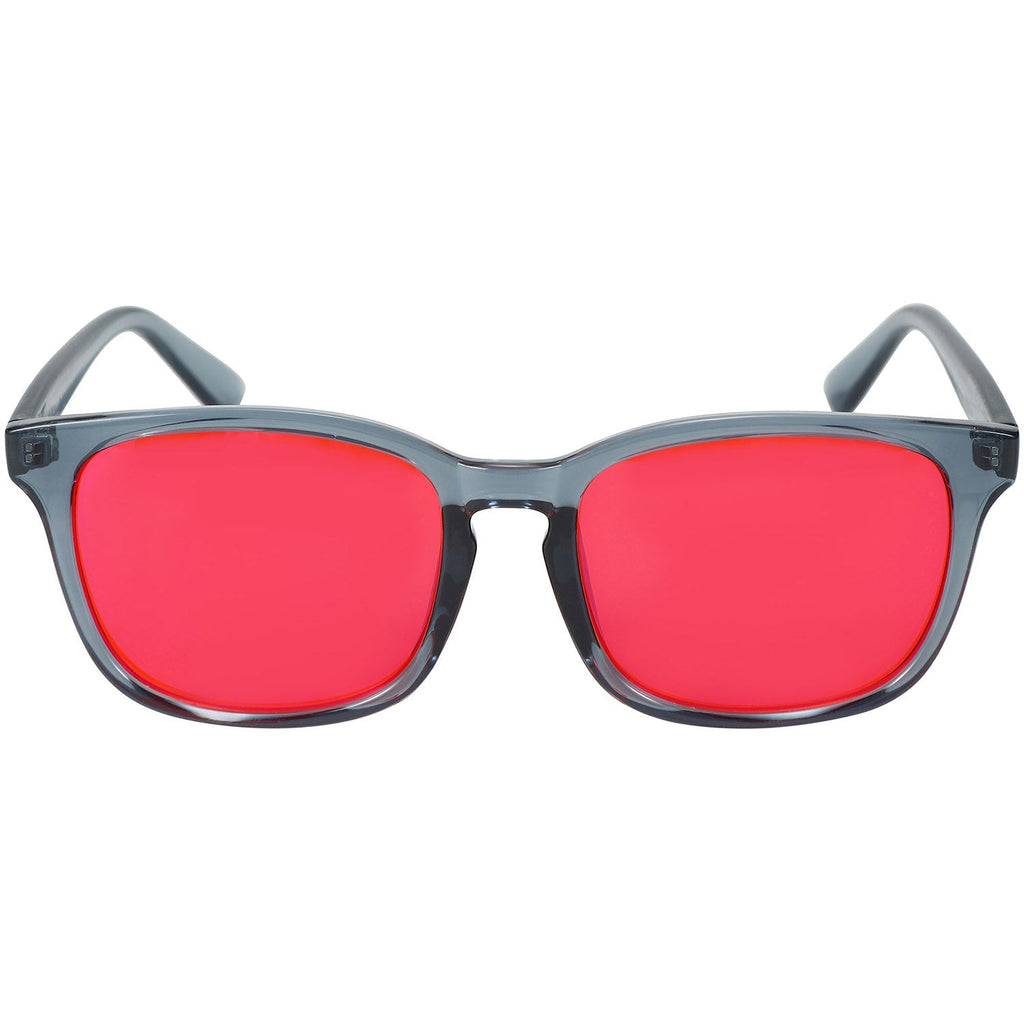 Blue Light Glasses by Sleep ZM with translucent blue frame and red-tinted lenses, designed for night-time use.