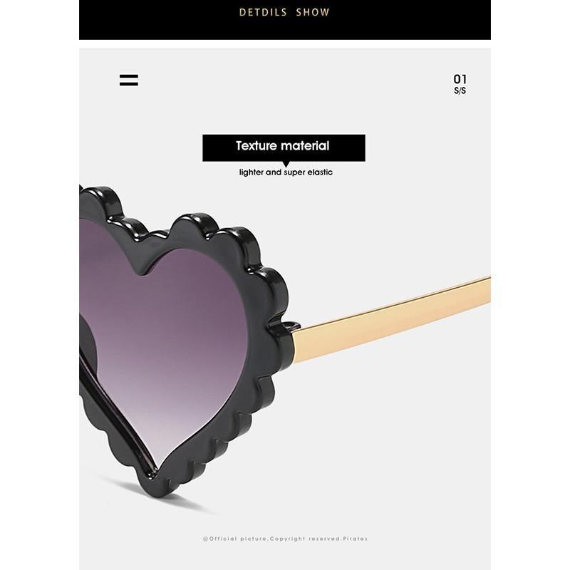 Kids' heart-shaped sunglasses by Stevvex with floral design, oversized frame, and UV protection for children’s fashionable sun protection.