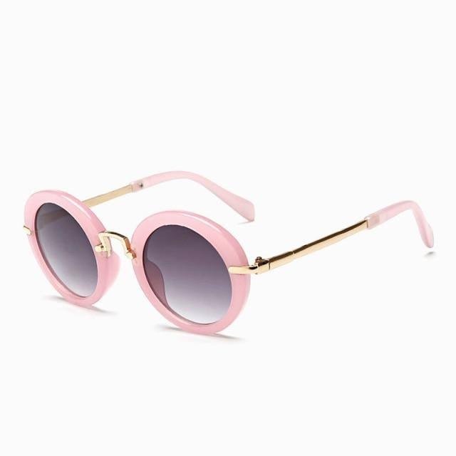 Cute round kids' sunglasses by Stevvex with colorful frames and UV400 protection, ideal for girls and boys' fashion and sunshade.