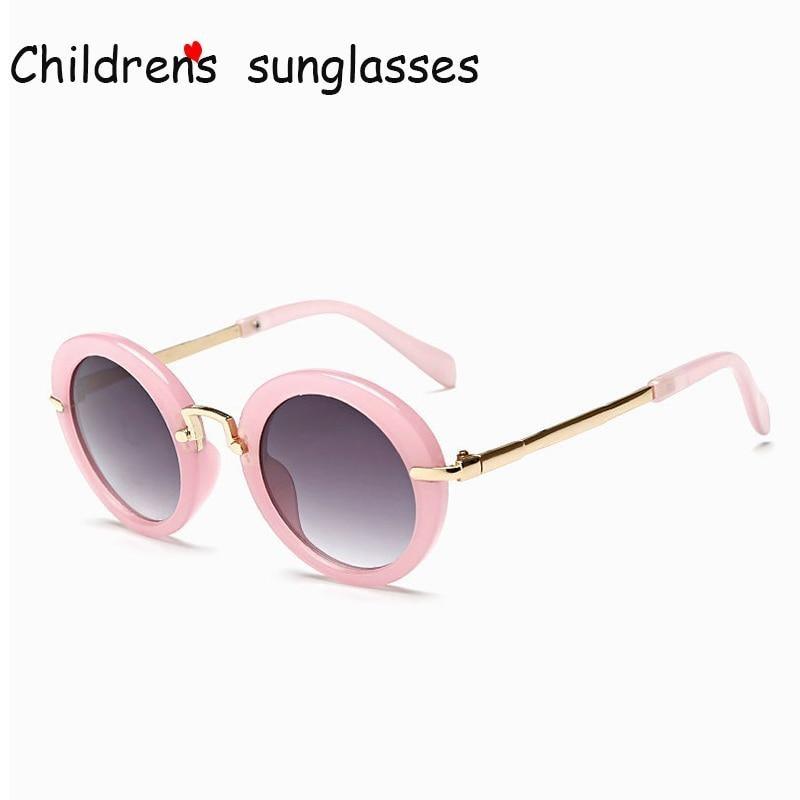 Cute round Stevvex kids' sunglasses with colorful frames and UV400 protection, ideal for boys and girls' sun protection.