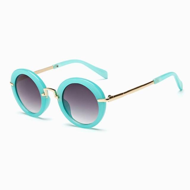 Cute round kids' sunglasses by Stevvex with colorful frames, polarized lenses, UV400 protection, ideal for boys and girls.