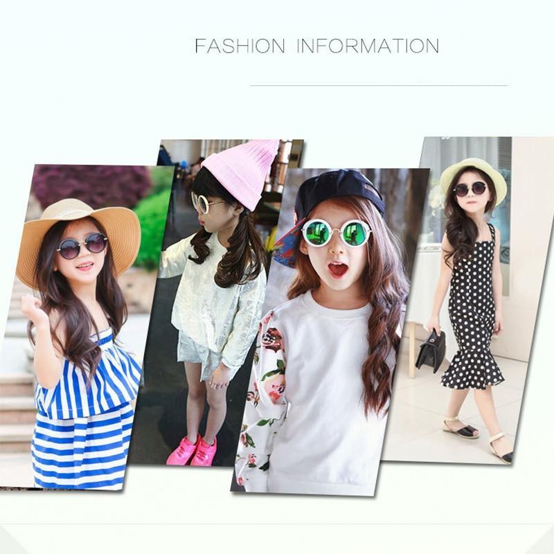 Cute round kids' sunglasses by Stevvex with UV400 protection, colorful mirror lenses, and fashionable child-friendly design.