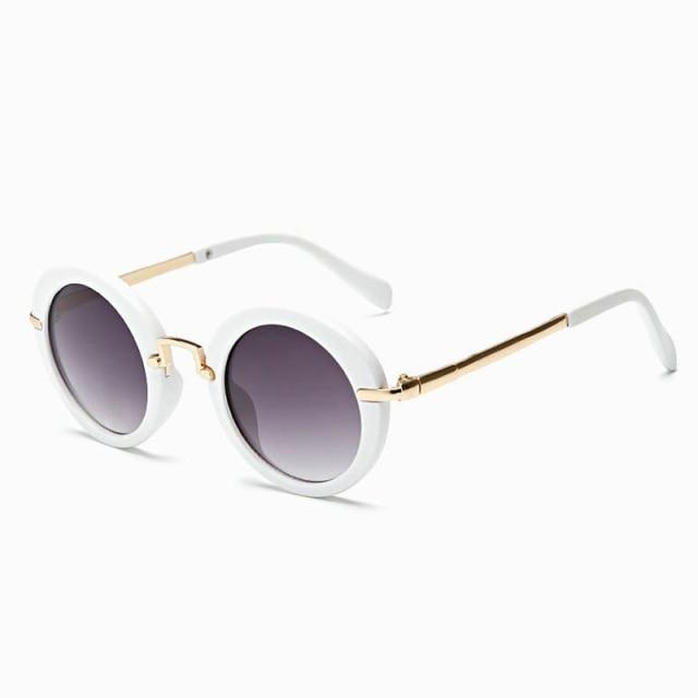 Cute round Stevvex sunglasses for kids with UV400 protection, colorful frames, polarized lenses, and fashionable children's sunshade.