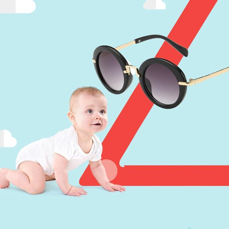 Fashionable Stevvex kids' round sunglasses with UV400 protection, colorful mirror lenses, and cute round frame for boys and girls.
