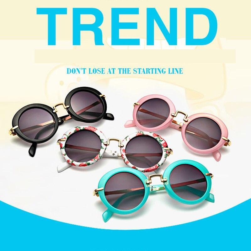 Stevvex kids' round sunglasses with UV400 protection, colorful frames, and mirror lenses for boys and girls.