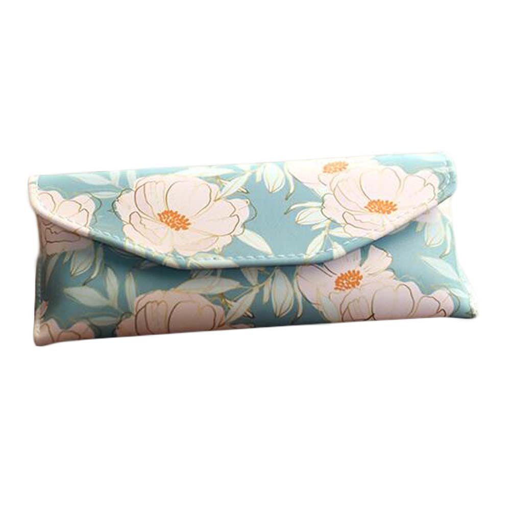 Blue flower eyeglass case by Berry Charmz, a stylish eyewear accessory with a floral design and soft interior for protection.