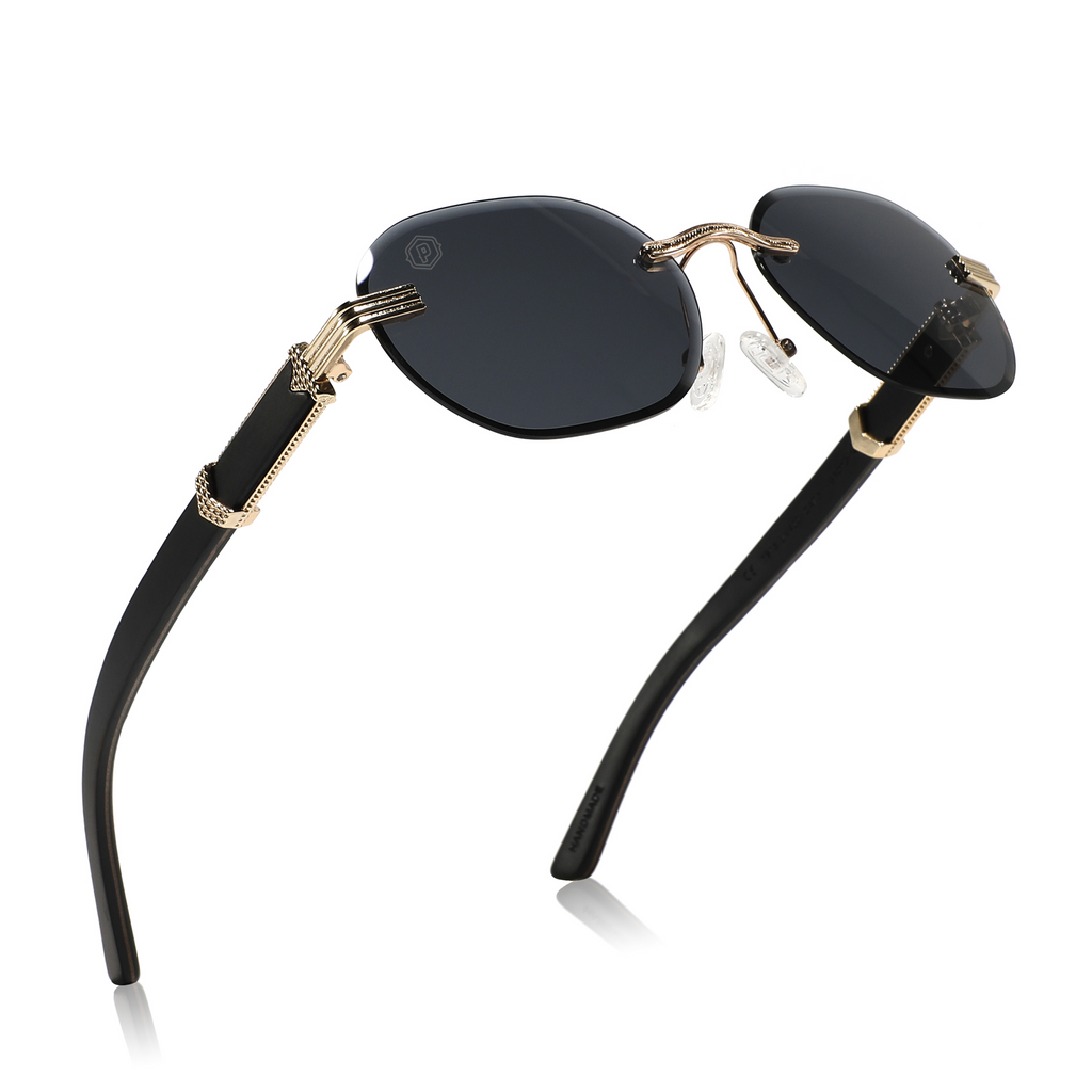 Handmade ebony wooden sunglasses from Papago's Midnight Agassiz collection, featuring sleek, recycled wood frames.