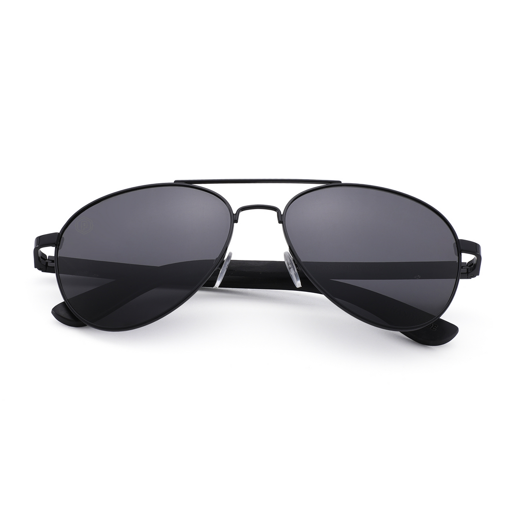 Handmade ebony wood Palomas sunglasses by Papago, featuring recycled wooden frames and stylish design.