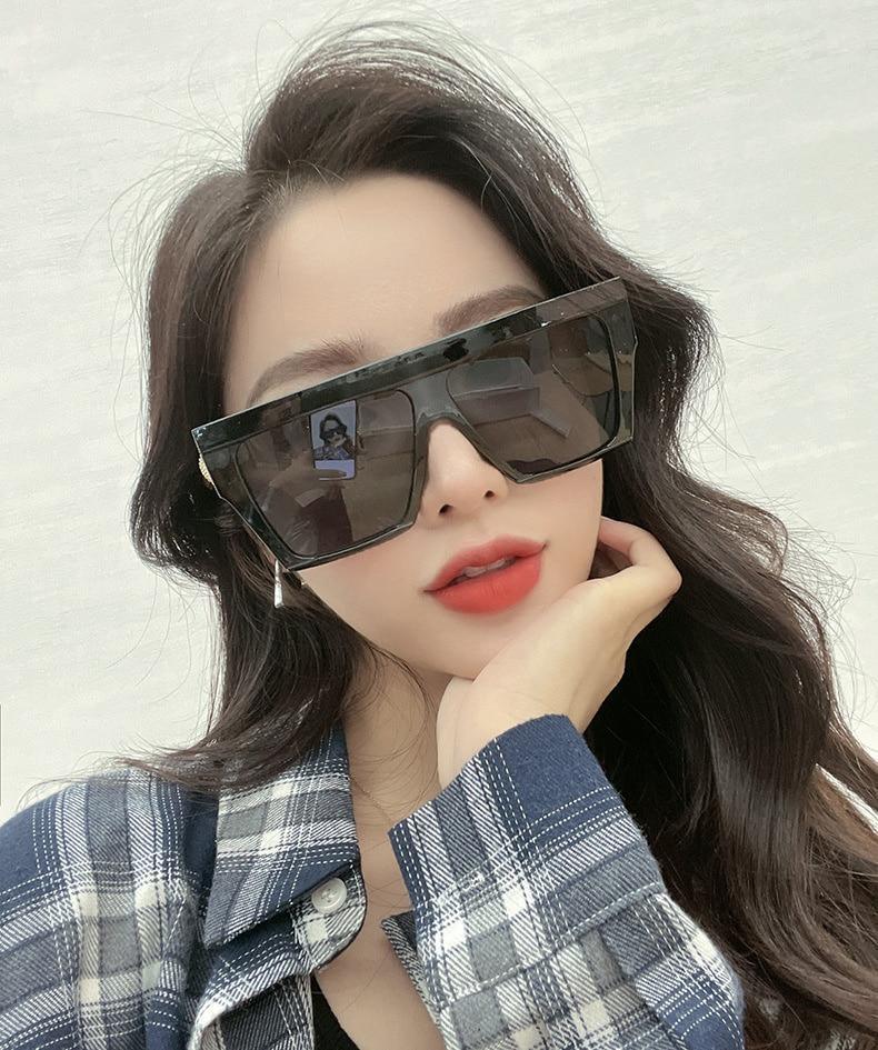 Fashionable oversized square shape sunglasses by Stevvex with a vintage style, large frame, flat-top design for women and men.