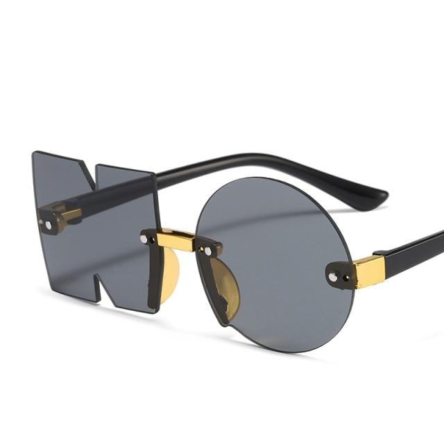 Stevvex rimless, irregular design sunglasses for men, women, and kids with oversized, polygon-shaped frames.
